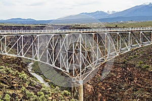 TheÂ RioÂ Grande Gorge Bridge-a steel deck archÂ bridge across theÂ RioÂ Grande GorgeÂ 10 miles northwest ofÂ Taos NM United